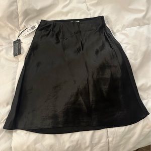 Aritzia slip mini in black, NWT